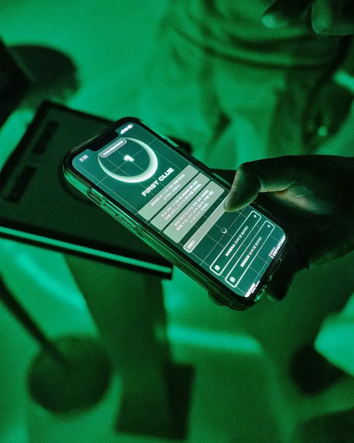 A visitor holding the Kasina Portal under UV light